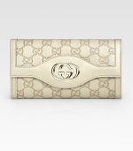 Rich, logo-stamped metallic leather in foldover silhouette topped with GG hardware.Magnetic snap flap pocketCenter zip pocketTwo inner compartmentsTwelve credit card slotsFully lined7½W X 4H X 1¼DMade in Italy