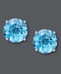 Perfect pools of blue. These round-cut blue topaz studs (8-1/2 ct. t.w.) shimmer in a 14k white gold setting. Approximate diameter: 2/5 inch.