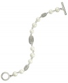 Classic chic. Lauren by Ralph Lauren's Town & Country bracelet is crafted from silver-tone mixed metal with simulated pearls and glass pave beads adding a refined look. Approximate length: 7-1/2 inches.