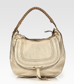 EXCLUSIVELY AT SAKS in Metallic Beige. A slouchy silhouette in frosted metallic calfskin leather, finished with a signature tennis-wrapped handle. Top handle, 8 dropTop zip closureHidden open pocket under flapOne inside zip pocketOne inside open pocketCotton lining15¾W X 15H X 5DMade in Italy