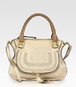 EXCLUSIVELY AT SAKS in Metallic Beige. Shimmering metallic calfskin leather covers this versatile shape, accented with elegantly-wrapped top handles in a contrasting tone. Double tennis-wrapped top handles, 6 dropShoulder strap, 18 dropTop zip closureHidden pocket under flapOne inside zip pocketOne inside open pocketCotton lining14½W X 10¾H X 4½DMade in Italy