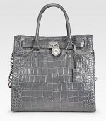 Glazed croc-embossed leather, cinched at the sides and finished with polished hardware.Double top handles, 5 drop Chain and leather shoulder strap, 11 drop Magnetic top closure Protective metal feet One inside zip pocket Four inside open pockets Logo-print lining 14W X 13H X 4½D Imported