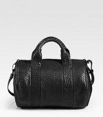 Sumptuous pebble-grain lambskin, styled in a roomy top-handle carryall with matte black hardware.Double top handles, 5 dropAdjustable shoulder strap, 13¼-13½ dropTop zip closureProtective metal feetOne inside zip pocketFully lined12W X 11H X 9DImported