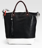 Rich leather in a classic bucket silhouette, accented with a chic oversized tassel at the handles.Double top handles, 5 dropAdjustable shoulder strap, 9-10 dropTop zip closureOne inside zip pocketThree inside open pocketsCotton lining16½W X 16½H X 6¾DImported