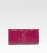 A simply elegant clutch in textured patent leather, stitched with the Yves Saint Laurent insignia. Magnetic snap flap closure One inside open pocket Satin lining 10¾W X 6½H X 1¼D Made in Italy 