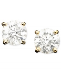 Lustrous and luxe - give yourself the gift of glamour all in a petite, sparkling package. These diamond stud earrings (1/3 ct. t.w.) are crafted in 14k gold. Approximate diameter: 3-1/2 mm.