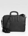 Protect your investment with this stylish computer case rendered in textured saffiano leather.Zip closureDouble top handlesAdjustable shoulder strapInterior pockets15¾W x 12H x 11DMade in Italy