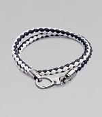 A richly-hued braided leather bracelet perfect for layering and wrap around styling.LeatherAbout 3 diam.Spring claspMade in Italy