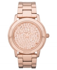 Like glistening stones on a shore, this enchanting watch from DKNY easily hypnotizes.