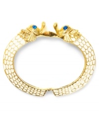 Slip on some sea-creature sass. Betsey Johnson's hinge bangle bracelet features sea horse details and blue-crystal accents. Set in ivory and gold tone mixed metal. Approximate diameter: 2-1/2 inches.