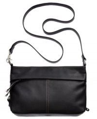 Wear with t-shirt and jeans or your favorite frilly frock, this versatile crossbody from Tignanello is the ultimate accessory. Clean lines, buttery-soft leather and subtle detail stitching grace the outside, while plenty of pockets and card slots inside can make your life feel more pulled together.