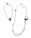 Two elegant looks combine into one chic style. Breil's versatile necklace can be worn as a single heart pendant, or as a long necklace accented by shimmering Mother of Pearl charms. Crafted in polished stainless steel. Approximate length: 14 inches + 4-inch extender. Approximate drop: 1-1/10 inches.