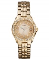 A stunning watch from GUESS with a rosy twist of crystal accented flair.