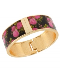 Classic cool. Betsey Johnson dresses up this hinged bangle bracelet, crafted from antique gold-tone mixed metal, with a lovely floral print. Item comes packaged in a signature Betsey Johnson Gift Box. Approximate diameter: 2-1/3 inches.