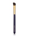 Angled brush sweeps on powder eyeshadow for allover base application plus definition on the outer lid and crease.