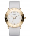 Simply pretty logo-loving style by Marc by Marc Jacobs. This watch features a white leather strap and round ion-plated goldtone stainless steel case. Logo at bezel. White dial with goldtone markers and logo. Quartz movement. Water resistant to 30 meters. Two-year limited warranty.