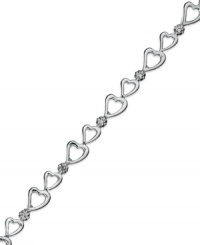 Follow your heart. Victoria Townsend's adorable bracelet features a row of open-cut hearts and shining diamond accents in sterling silver. Approximate length: 7 inches.