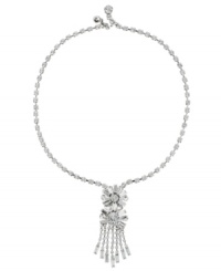 Totally trendy. Just as fringe embellishment is a hip look in handbags, Monet innovatively incorporates it into a chic collar necklace. Adorned with sparkling Swarovski crystals, it's set in silver tone mixed metal. Approximate length: 18 inches. Approximate drop: 2-3/4 inches.