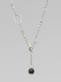 From the Naga Collection. Clasp the dragon head wherever you wish along this graceful open sautoir chain with a delicate drop of white sapphires and black chalcedony.White sapphireBlack chalcedonySterling silverLength, about 45Imported