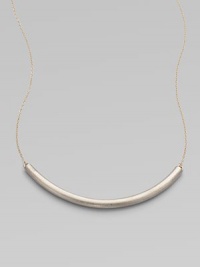 Eye-catching in its elegant simplicity, a gracefully curved, matte-finished silver bar appears to float on a delicate golden chain.SilverplatedGoldtoneLength, about 18Hook claspMade in USA