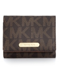 Signature style takes center stage with this monogram wallet from MICHAEL Michael Kors. Rich Saffiano leather is accented with golden hardware, while the pocket-lined interior stashes essentials with ease.