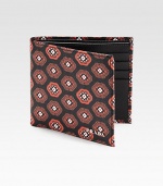 Colorful print pattern adorns this artful design crafted in textured saffiano leather.Two billfold compartmentsEight card slotsLeather4W x 4HMade in Italy