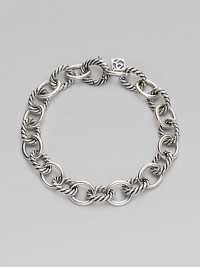 Alternating smooth and cable links create a bracelet that's both classic and of-the-moment with true Yurman style. Sterling silver Length, about 7¼ Spring ring clasp Imported