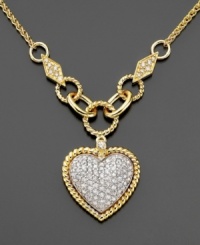 A stunning cluster of round-cut pavé diamonds (3/4 ct. t.w.) creates a very touching heart on Effy Collection's diamond necklace. Crafted in 14k white and 14k gold. Approximate length: 16 inches. Approximate drop: 3/4 inch.