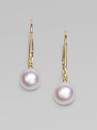 A lustrous piece that features Akoya pearls with radiant 18k gold. 7mm white, round, Akoya pearls18k goldDrop, 1Lever backImported 