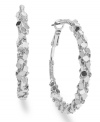 Create some serious earring envy with a high-shine style from Style&co. Clusters of small silver tone shapes cover this classic hoop silhouette. Approximate drop: 1-3/4 inches.