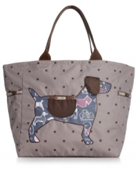 Dog gone it. Shoulder this picture perfect tote from LeSportsac, featuring a cute canine. Spot splashed with pockets aplenty, it's just right for jaunts to the gym or weekends away.