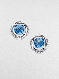 From the Infinity Collection. A richly colored, faceted blue topaz framed in intertwining bands of polished sterling silver, one smooth, one a signature cable.Blue topazSterling silverDiameter, about ¼Post backImported