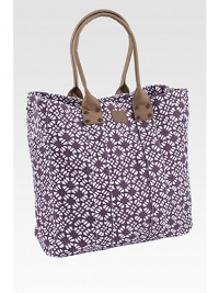 A graphic floral printed is both sweet and sophisticated, printed on sturdy cotton for this roomy tote.Magnetic snap closureLeather double handlesInside zip pocketsComplementary striped lining17½H X 16½W X 6¼DCottonSpot cleanImported