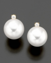 It's hard to improve upon perfection, but these earrings master the challenge with stunning cultured freshwater pearls (9-10 mm) and sparkling diamond accents. In 14k gold.