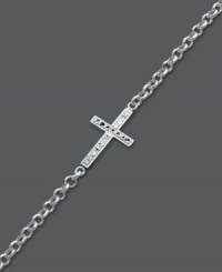 A modern update on the traditional cross. Studio Silver adds a simple twist by turning a symbolic cross charm on its side. Crafted in sterling silver with diamond-cut accents and rhodium plating to prevent tarnishing. Approximate length: 7-1/2 inches.