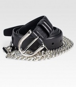 Shiny chain links and edgy stud detail defines this modern classic finished in rich Italian leather.LeatherAbout 1 wideMade in Italy