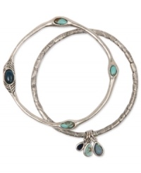 Get set up with this beautiful bangle duo from Lucky Brand. Accented by an assortment of semi-precious turquoise stones, this set will lend a look of laid-back luxe to your bracelet wardrobe. Crafted in silver tone mixed metal. Approximate diameter: 2-1/2 inches.