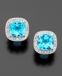 Light up the room with beautiful cushion-cut blue topaz earrings(2-3/4 ct. t.w.) surrounded by sparkling round-cut diamonds (1/4 ct. t.w.) set in 14k white gold.