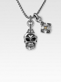 A wholly original and utterly fashionable look in braided sterling silver with a weighty skull accent, and another cross charm studded with 18K gold. From the UnKaged Collection Skull, 1H Cross, ¾H Endless chain, 26 long Made in USA