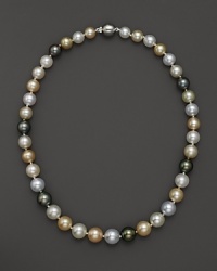 Graduated South Sea pearls in softly shimmering shades meet at a white gold clasp.