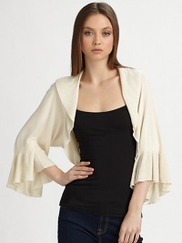 This soft knit style is finished with a delicately ribbed shawl collar and matching flutter cuffs.Rib-knit shawl collarThree-quarter sleeves with rib-knit flutter cuffsAbout 12 from shoulder to hem80% rayon/20% nylonImportedDry clean