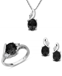 Nothing but class. This three-piece jewelry set features a pendant, ring and drop earrings that highlight oval-cut onyx (5-1/5 ct. t.w.) and round-cut white topaz (3/8 ct. t.w.). Set in sterling silver. Approximate length (pendant): 18 inches. Approximate drop (pendant): 3/4 inch. Ring Size 7.