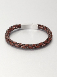 Braided brown Italian leather band with sterling silver clasp. Tension-held box clasp About 8½ long Embossed signature Made in United Kingdom