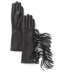 Fabulously fringed and lined in cashmere, these buttery leather gloves from MICHAEL Michael Kors blend chic sophistication with bold biker style.