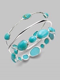 From the Scultura Collection. Subtly hammered sterling silver is dotted with smooth, vibrant stones of turquoise cabochon.Turquoise cabochon Sterling silver Diameter, about 2½ Imported