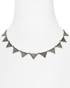 Make a subversive statement with this House of Harlow 1960 necklace, accented by a collar of edge right triangle stations.