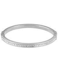 Style meant for stacking. This must-have design by Michael Kors combines a thin, stackable bangle with pave-set glass accents. Set in silver tone mixed metal. Approximate diameter: 2-1/2 inches.