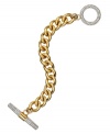 Chunky steel links in gold tones create huge style on this Juicy Couture bracelet. With a toggle closure embellished with pave crystal accents. Crafted of gold ion-plated stainless steel. Approximate length: 8 inches.