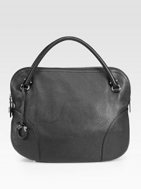 Sumptuous Vitello safari leather crafted in a uniquely-shaped hobo silhouette that's both sleek and rounded.Double top handles, 3½ dropTop zip closureProtective metal feetOne inside zip pocketTwo inside open pocketsFully lined16½W X 12H X 5½DMade in Italy