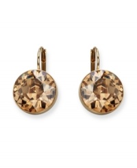 Be a golden girl in these stunners from Swarovski. Earrings feature bold yellow crystals on gold-plated mixed metal. Approximate drop: 1 inch.